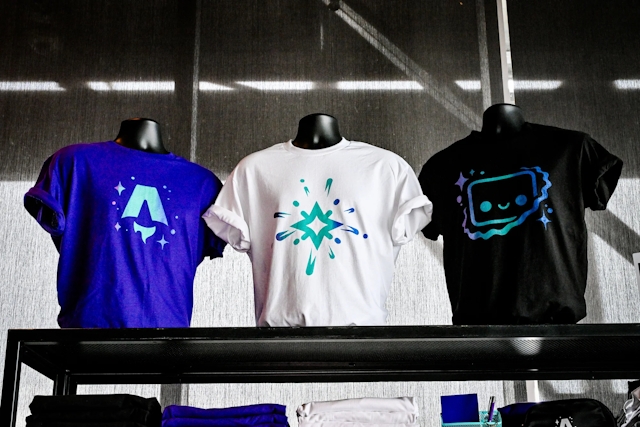 Three Astro t-shirt designs displayed on torso manequins: the Astro Together logo, the Starlight logo, and Houston.