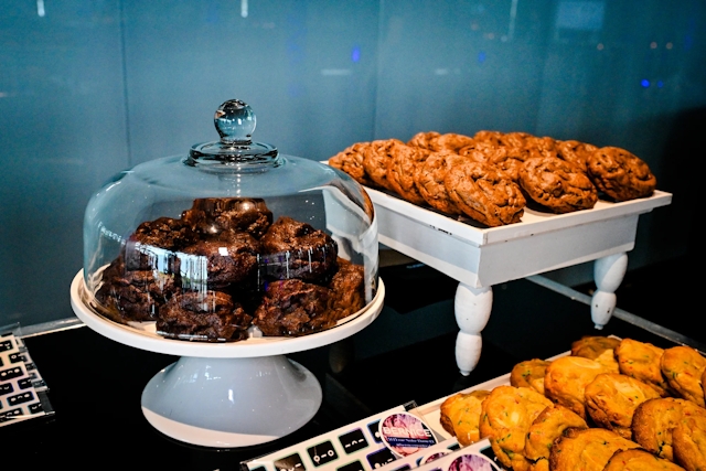 An assortment of cookies displayed at the gourmet cookie bar.