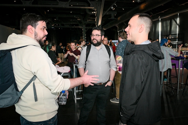 A group of guests talking to each other.